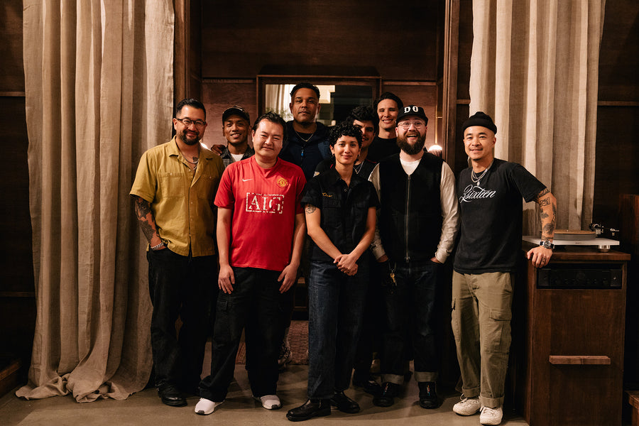 A number of 3sixteen employees pose for a picture.