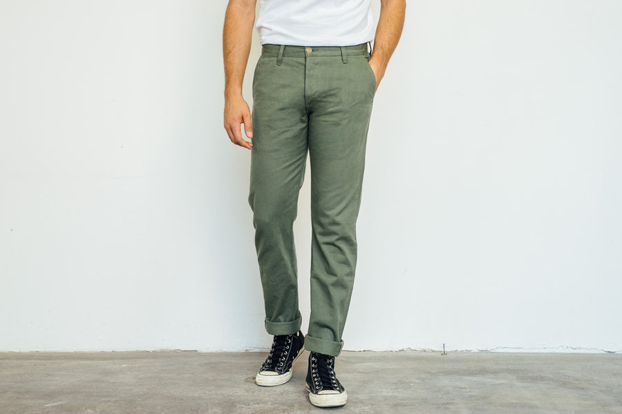 Man wearing olive chinos.