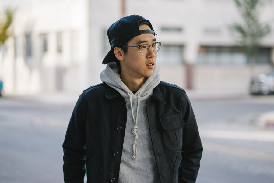 Shown is a grey pullover hoody layered under our hunting jacket